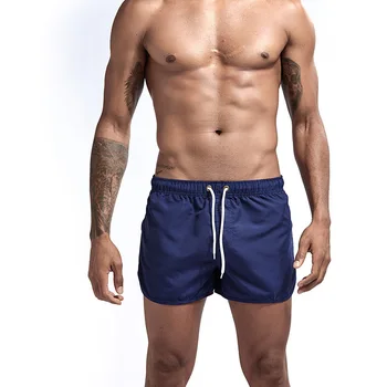 Pánské šortky rychleschnoucí s fitness kulturistika cvičení šortky Muži vysoce kvalitní musculation muži Beach Šortky