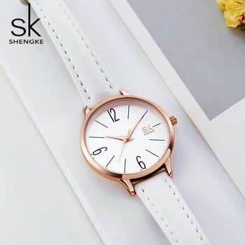 Shengke Módní dámské Hodinky Bílé Kůže Dívka Náramkové hodinky Jednoduché Dámské Quartz Hodiny Pohodlné Spona Kulatá Případ Hodinu